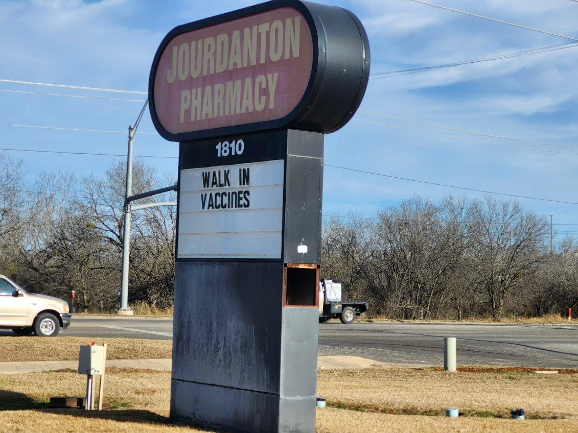 Jourdanton Pharmacy roadside sign at 1810 East State Highway 97
